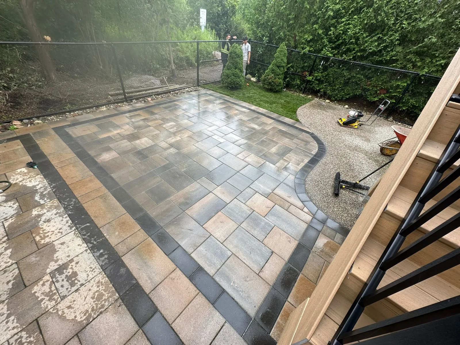 Modern outdoor living space with paver patio