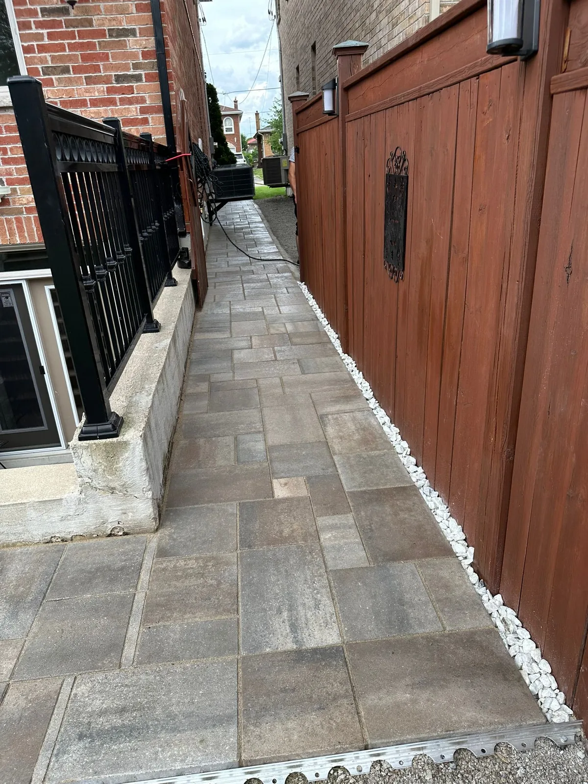 Custom outdoor dining area with interlocking patio